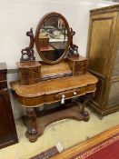 A Victorian mahogany Duchesse dressing table, width 126cm, depth 50cm, height 159cm