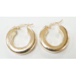 A pair of modern 14k yellow metal hoop earrings, 20mm, 5.8 grams.