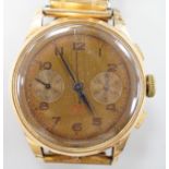 A 1950's? Swiss 18k chronograph manual wind wrist watch, on later associated flexible bracelet.