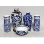 A pair of Chinese blue and white sleeve vases, a crackle ware vase, a dragon vase and a bowl,