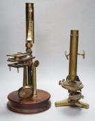 Three antique brass microscopes, one stamped R & J Beck London & Philadelphia, 37cm high