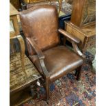 A George III style tan leather beech Gainsborough style chair, width 60cm, depth 56cm, height 95cm