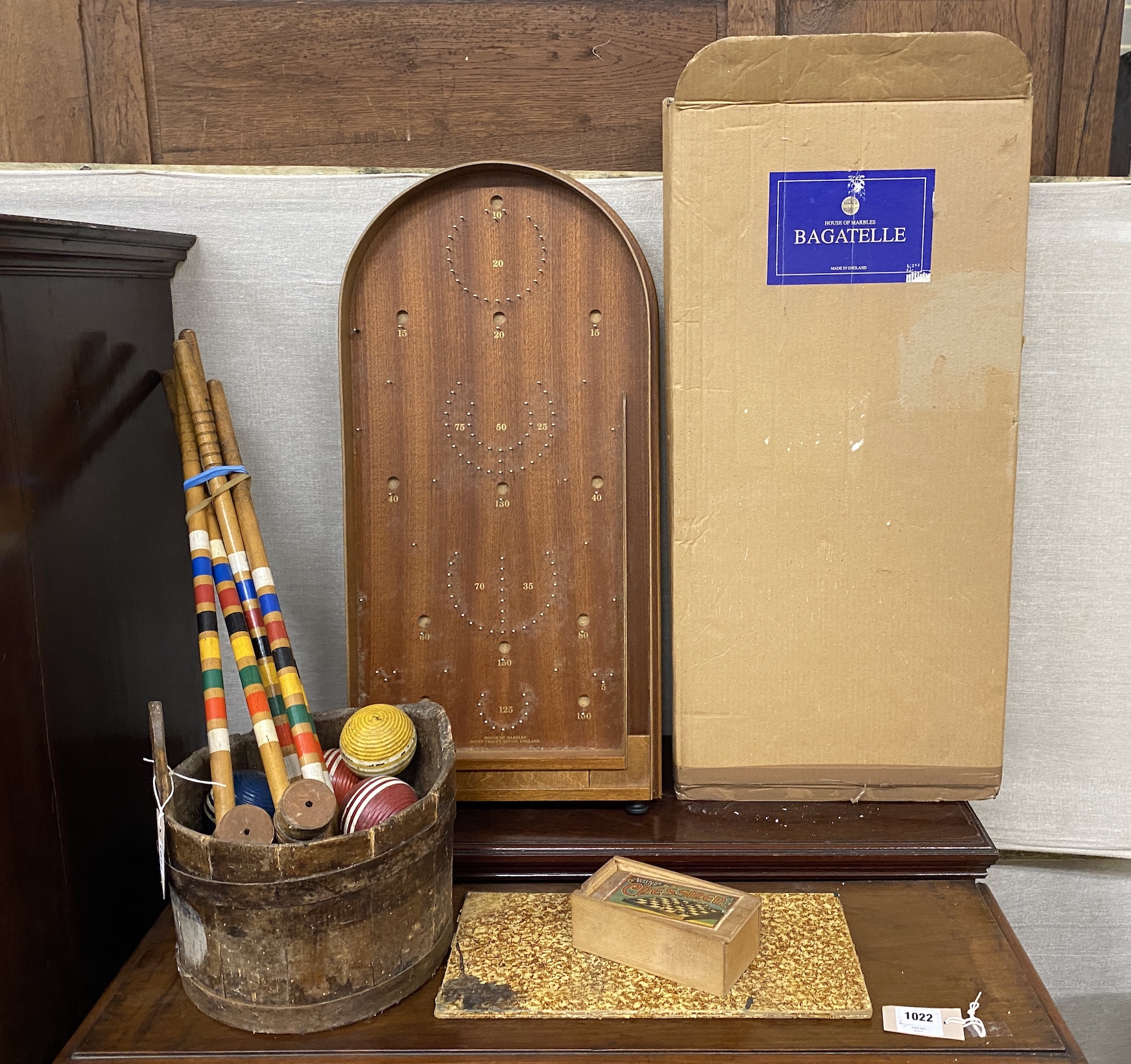 A child's croquet set and assorted games etc.