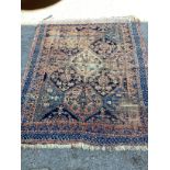 An antique Afshar blue ground rug 165cm x 133cm.