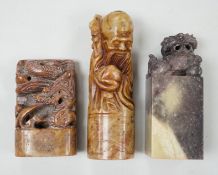 Three Chinese soapstone seals, tallest 12cm high