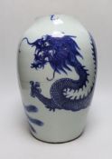 A Chinese blue and white ‘dragon’ vase, Qing dynasty, neck cut down, 33cm high