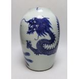 A Chinese blue and white ‘dragon’ vase, Qing dynasty, neck cut down, 33cm high