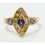 An early 20th century yellow metal, sapphire and seed pearl set marquise cluster ring (pearls