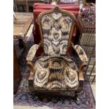 A late Victorian inlaid walnut open armchair, width 73cm, depth 56cm, height 102cm