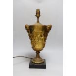 An ormolu urn shaped 'Bacchus' table lamp, 36cm high