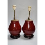 A pair of Chinese sang de boeuf glazed vases, mounted as lamps 23cm high excluding light fitting