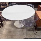 Three Habitat perspex armchairs and a Habitat ‘’Chelsea’’ circular white laminated wood table,