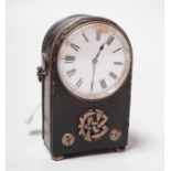 An unusual French White metal wall mounted black Morocco leather covered travelling timepiece, 9.5