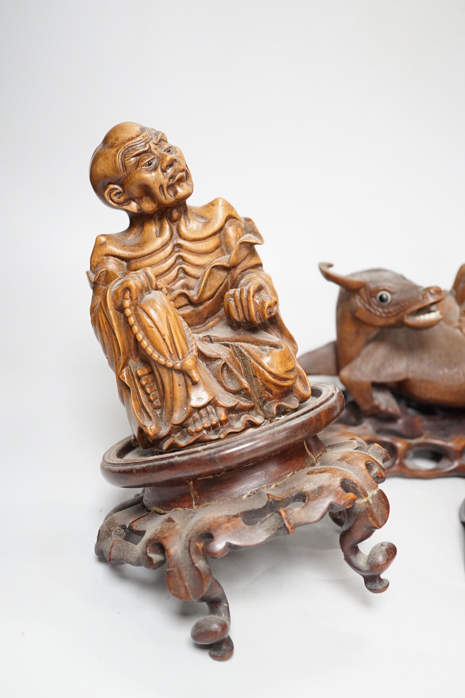 A pair of Chinese carved hardwood buffalo carvings, and a similar figure of a luohan, latter - Image 4 of 8