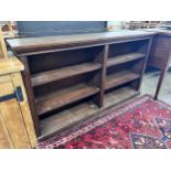 An early 20th century oak open dwarf bookcase, width 160cm, depth 28cm, height 91cm