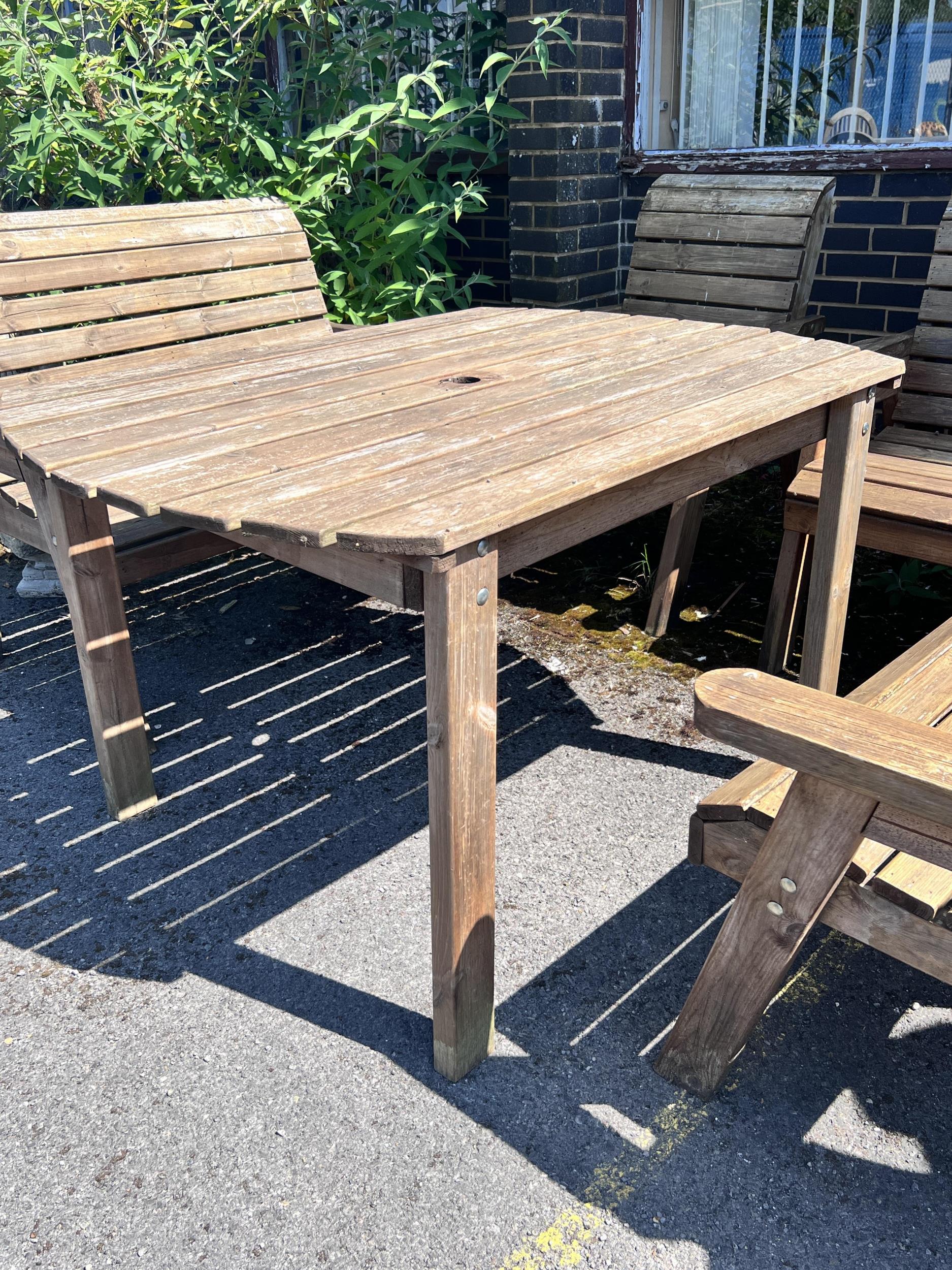 A rectangular slatted teak garden table, length 130cm, width 96cm, height 79cm, together with a pair - Image 5 of 10