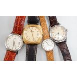 Three assorted gentleman's steel or gilt wrist watches, including retailed by Buhre and a lady's