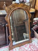 An 18th century style walnut fretwork cut wall mirror, width 43cm, height 68cm