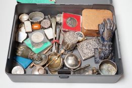 A collection of silver and white metal pill boxes, niello purse, lorgnette and assorted