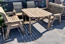 A rectangular slatted teak garden table, length 130cm, width 96cm, height 79cm, together with a pair