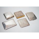 Three assorted silver cigarette cases, a silver tobacco box sleeve and a George V silver