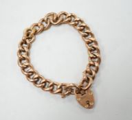 An Edwardian 9ct gold curb link bracelet, with heart shaped padlock clasp, 19cm, 16.2 grams.
