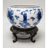 A 19th century Chinese blue and white ‘eight immortals’ alms bowl, apocryphal Qianlong seal mark,