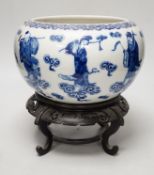 A 19th century Chinese blue and white ‘eight immortals’ alms bowl, apocryphal Qianlong seal mark,