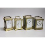 Four various brass carriage timepieces, tallest 14cm