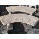 A pair of curved reconstituted stone garden benches, width 122cm, height 45cm