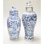 A Chinese blue and white ‘dragon’ vase and cover, and another, tallest 32cm; some damage