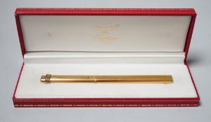 A boxed Must de Cartier pen