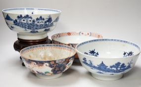 Four 18th century Chinese porcelain bowls (a.f), one with hardwood stand, largest 28cm diameter