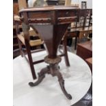 A Victorian octagonal rosewood trumpet work table, width 44cm, height 74cm