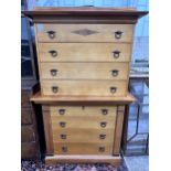 A Biedermeier style bois clair eight drawer chest on chest, width 104cm, depth 55cm, height 173cm