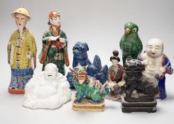 A group of assorted Chinese and Japanese pottery and porcelain figures, 19th/20th century, tallest