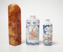 Two Chinese porcelain snuff bottles and a Chinese soapstone seal, 12.7cm