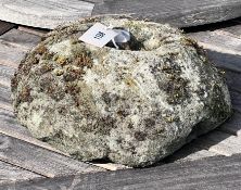 An Ancient puddingstone Quern, c.200 BC, diameter 30cm