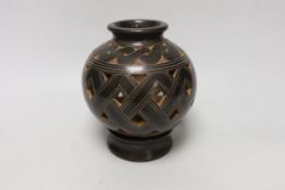 A Nicaraguan studio pottery vase and matching stand, signed on base of vase Roger Calero, 17cm