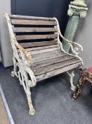 A Victorian painted cast iron slatted garden seat, reduced, width 67cm, depth 64cm, height 76cm