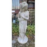 A reconstituted stone garden statue of a female bather, height 120cm