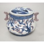 A Chinese underglaze blue and copper red pot and cover, 12cm high