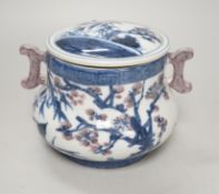 A Chinese underglaze blue and copper red pot and cover, 12cm high