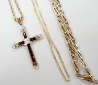 A modern 9ct gold, sapphire and diamond cluster set cross pendant, 33mm, on a 9ct gold chain and two