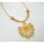 An Indian yellow metal two colour enamel and seed pearl set drop pendant necklace, overall, 45cm,