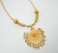 An Indian yellow metal two colour enamel and seed pearl set drop pendant necklace, overall, 45cm,