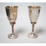 A pair of Elizabeth II silver goblets, with Prince of Wales feathers stem, St. James House Co.