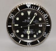 A Rolex style advertising quartz wall clock, 34cm diameter