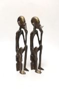 A pair of African figural bronzes, 27cm high
