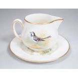 A Royal Worcester titled bird part tea set painted by W Powell